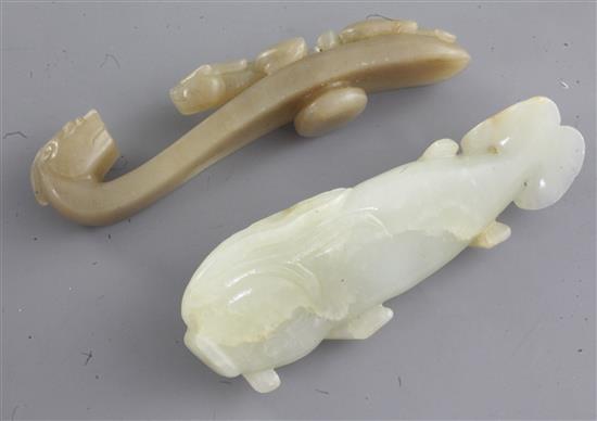 A Chinese jade belt hook and a Chinese jade figure of a cat fish, 19th and 20th century, 9.5cm